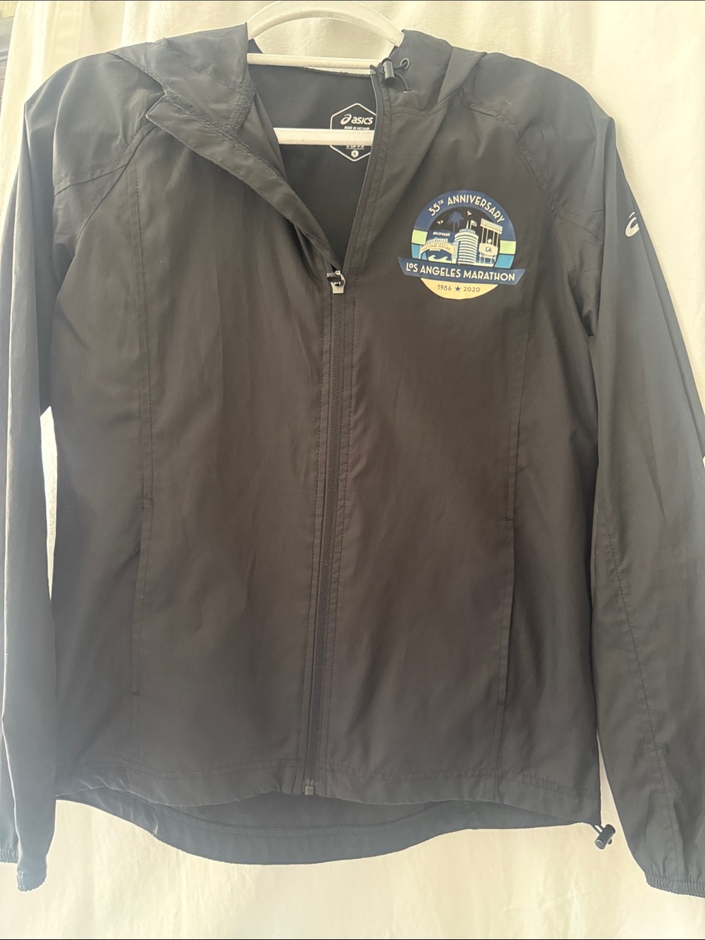 Asics Black Hooded Marathon Windbreaker with Blue Accent Patch